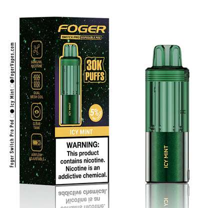 Foger Switch Pro Disposable Pod 30K in Icy Mint flavor, single pack. Features include 30,000 puffs capacity, 5% nicotine content, dual mesh coil technology, clear tank, and adjustable airflow. Packaging emphasizes compatibility with Switch Pro charging devices.