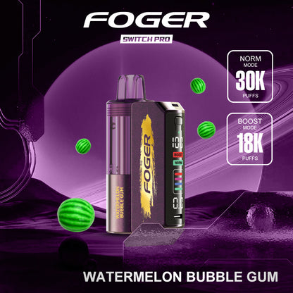 Foger Switch Pro Kit 30k device in Watermelon Bubble Gum flavor, designed with a purple transparent tank and gold logo. Features an OLED smart screen displaying Boost and Norm modes, battery life indicators, and customizable power levels. Includes dual mesh coil technology, adjustable airflow, and 5% nicotine content.