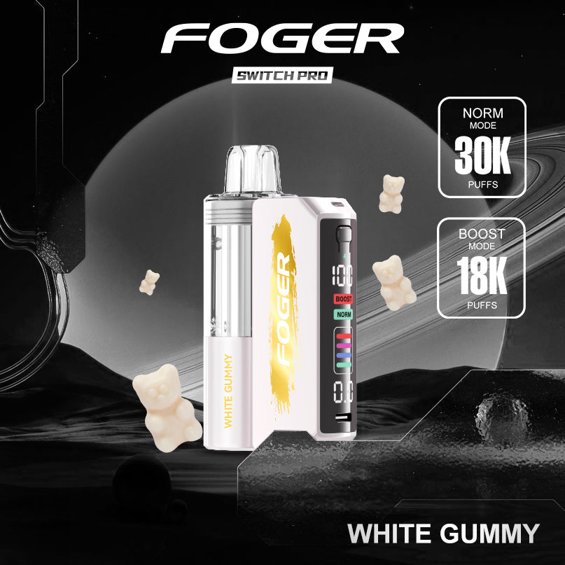 Promotional shot of the Foger Switch Pro Kit White Gummy flavor set against a cosmic-themed background with floating gummy bears. Offers 30K puffs in Normal mode and 18K puffs in Boost mode.